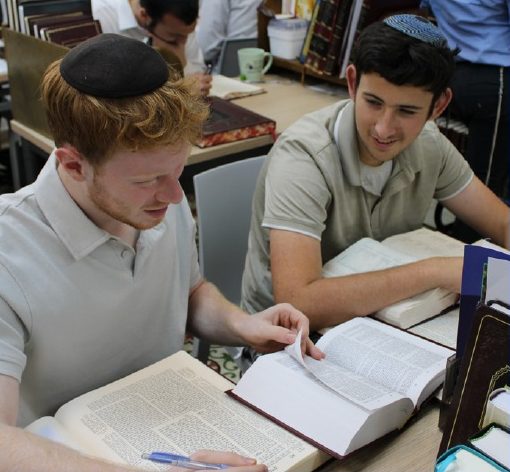 Two talmidim learning together over a Gemara