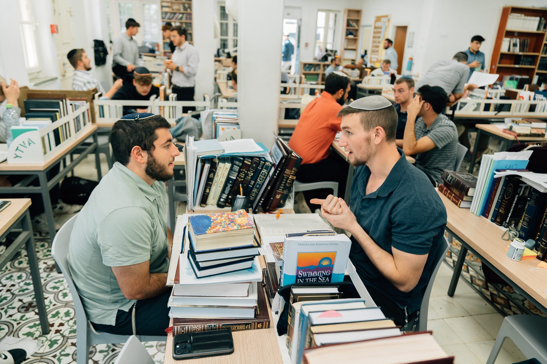 The Beit Midrash on a weekday morning, a chayal in uniform back among the talmidim
